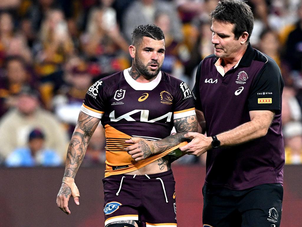 Adam Reynolds leaves the field with a suspected ruptured biceps. Picture: Bradley Kanaris/Getty Images