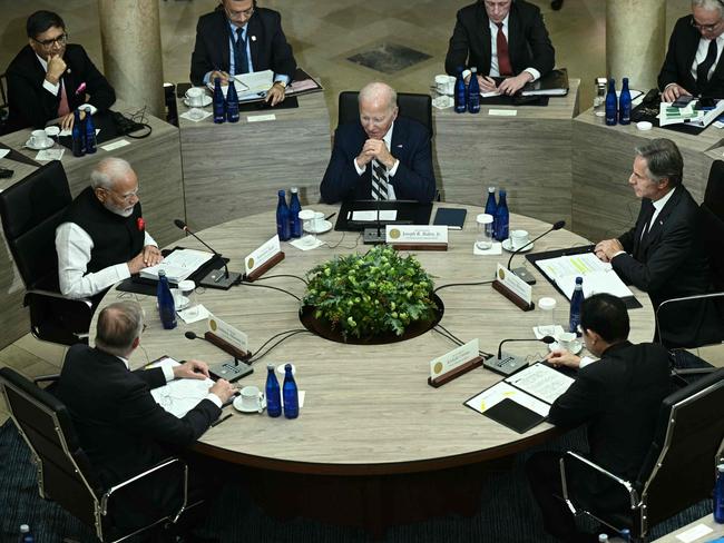 US President Joe Biden (C) meets with Australian Prime Minister Anthony Albanese (L), Indian Prime Minister Narendra Modi (2L), Japanese Prime Minister Fumio Kishida (2R) and US Secretary of State Antony Blinken (R) during the Quadrilateral Summit at the Archmere Academy in Wilmington, Delaware, on September 21, 2024. (Photo by Brendan SMIALOWSKI / AFP)