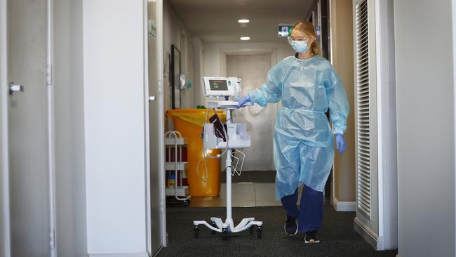 Nurse unit manager Bella Daniel checks on patients by going room to room. Picture: Sam Ruttyn