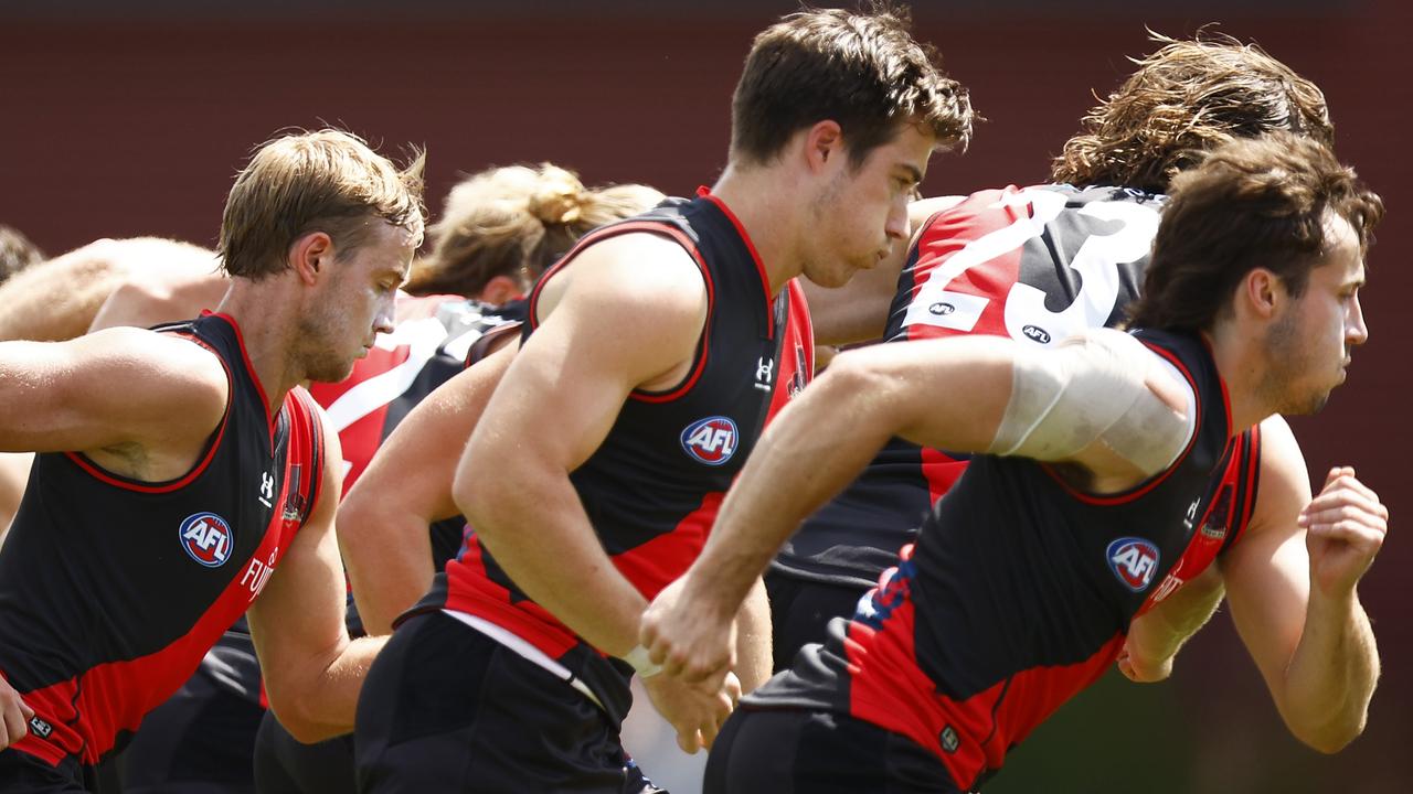 The big three: form of midfielders Darcy Parish, Zac Merrett and Andrew McGrath will be the key to success at Bomberland.