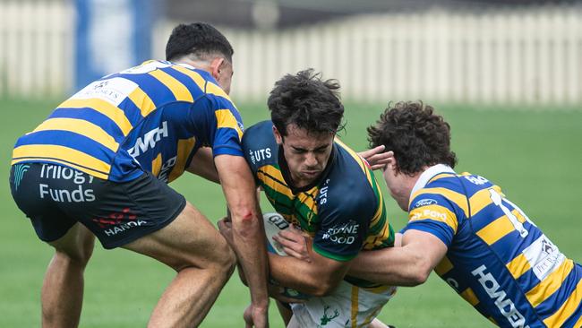 Gordon player Aaron Neville-Smith runs into trouble