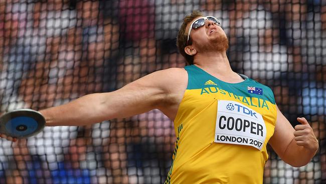 Australia's Mitchell Cooper competes in the qualifying round of the men's discus throw athletics event at the 2017 IAAF World Championships at the London Stadium in London on August 4, 2017. / AFP PHOTO / Andrej ISAKOVIC