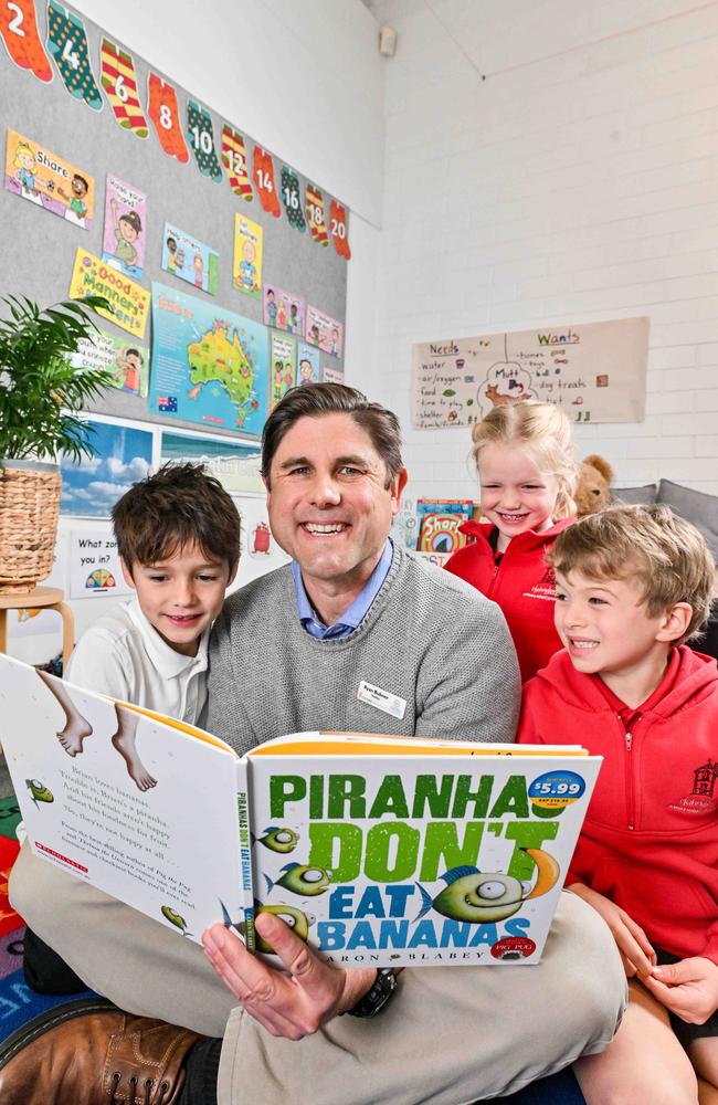 Hahndorf Primary School reception teacher Ryan Bubner with students Oscar, Imogen and Flynn. Picture: Brenton Edwards