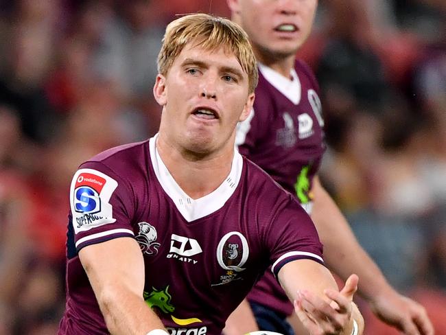 Tate McDermott (left) of the Reds in action during the Round 5 Super Rugby match between the Queensland Reds and the Sharks at Suncorp Stadium in Brisbane, Saturday, February 29, 2020. (AAP Image/Darren England) NO ARCHIVING, EDITORIAL USE ONLY