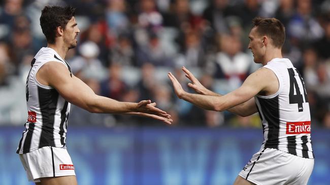 Scott Pendlebury of the Magpies celebrates a goal