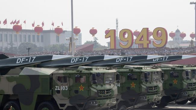 Chinese military vehicles carrying DF-17 during Tuesday’s parade to commemorate the 70th anniversary of the founding of Communist China in Beijing. Picture: AP