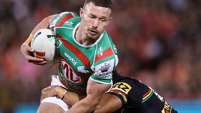 PENRITH, AUSTRALIA – MARCH 09: Damien Cook of the Rabbitohs is tackled during the round two NRL match between the Penrith Panthers and the South Sydney Rabbitohs at BlueBet Stadium on March 09, 2023 in Penrith, Australia. (Photo by Cameron Spencer/Getty Images)