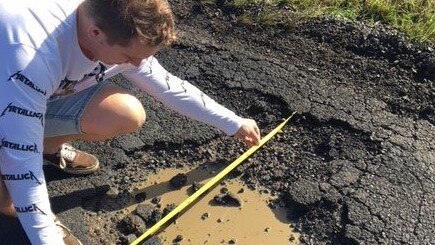 On holiday visiting family, Geraldine Grimish was driving along Caniaba Road into Lismore on a wet night of July 5 when the pothole punctured the front left passenger side tyre and damaged both rims of her car, costing her $750.