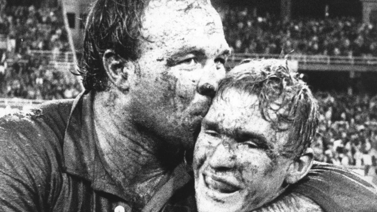 Captain Wally Lewis (L) gives Allan Langer a kiss on his head after Queensland defeated NSW in State of Origin game to claim 1987 series, at SCG in Sydney, 16/06/1987. Pic News Limited.