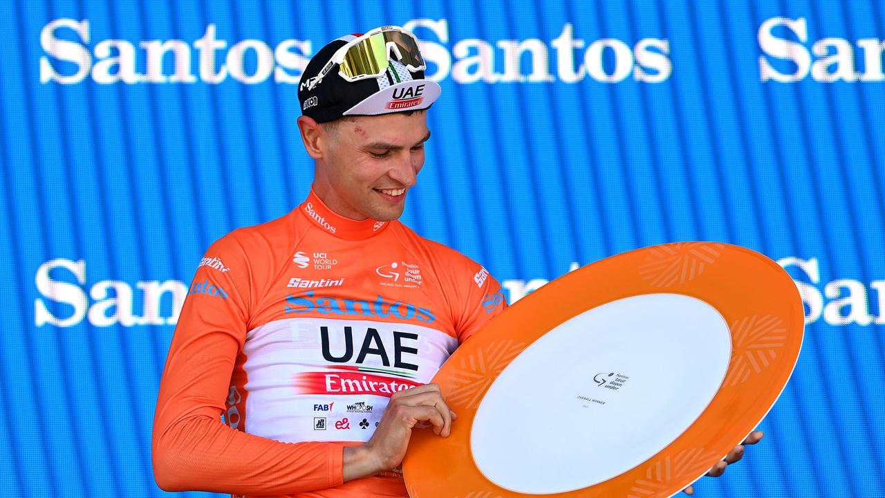 MOUNT LOFTY, AUSTRALIA - JANUARY 22: Jay Vine of Australia and UAE Team Emirates celebrates at podium as Orange Leader Jersey during the 23rd Santos Tour Down Under 2023 - Stage 5 a 112,5km stage from Unley to Mount Lofty 727m / #TourDownUnder / #WorldTour / on January 22, 2023 in Mount Lofty, Australia. (Photo by Tim de Waele/Getty Images)