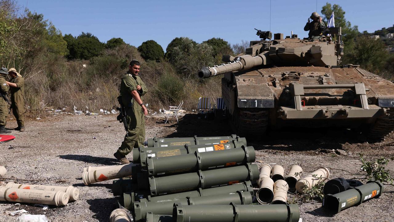 Israeli soldiers man a position at an undisclosed location on the border with Lebanon on October 21, 2023. Picture: AFP/Jalaa Marey