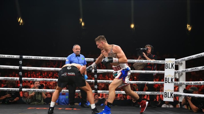 Dylan Biggs hits Nikita Tszyu during the bout between the two fighters last year. Picture: No Limit Boxing