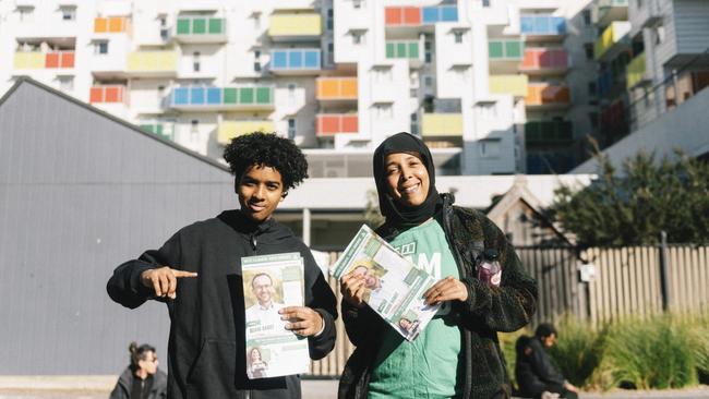 Greens volunteers pose outside a polling centre in Fitzroy on May 21 in Melbourne.