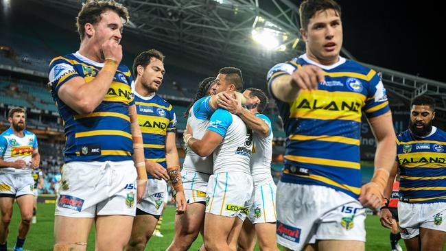 Phillip Sami (centre) of the Titans reacts after scoring against the Eels during the Round 21 NRL match between the Parramatta Eels and the Gold Coast Titans at ANZ Stadium in Sydney, Saturday, August 4, 2018. (AAP Image/Brendan Esposito) NO ARCHIVING, EDITORIAL USE ONLY