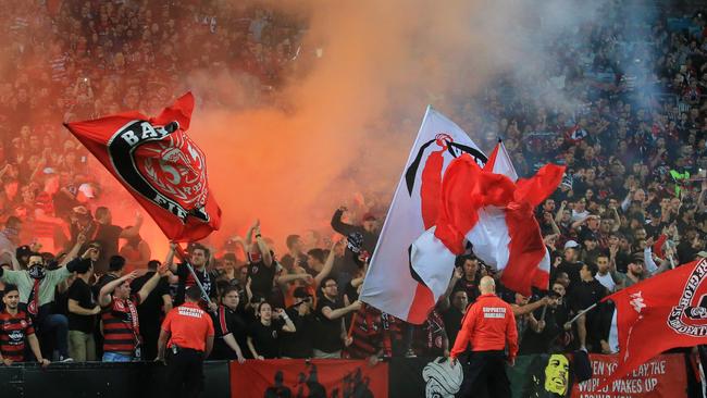A flare goes off in the RBB during the Western Sydney Wanderers derby against Sydney FC. Pic Mark Evans
