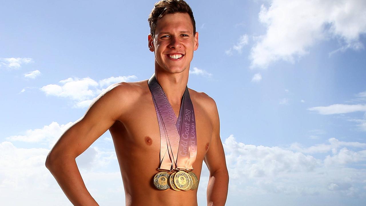 Mitch Larkin and the Australian Dolphins swim team gather for the media after their most successful Commonwealth Games. Pics Adam Head