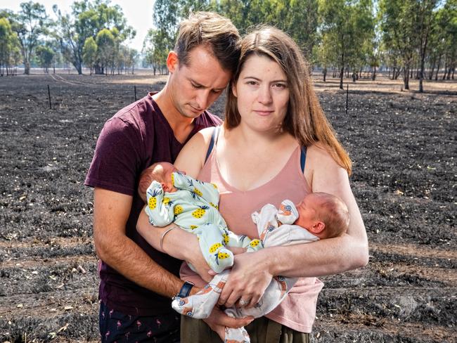 Kaysie and Sam Stephens with their 6 day old baby twins Oakleigh and Oliver.  The couple had twins in amongst being evacuated from the fires. Their house is ok but they are unable to go home. They live in Tintaldra. Photo: Simon Dallinger