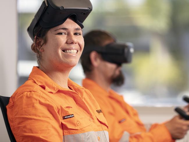 New BHP FutureFit Academy trainees Whitney Cross and Lee Goodall try out the virtual reality training technology. Picture: supplied