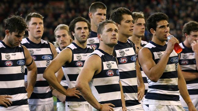 Joel Selwood and his disappointed Geelong teammates after the siren. Picture: Wayne Ludbey