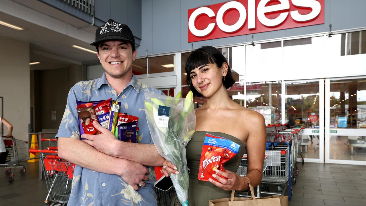 Oliver Foley and Helena Youhana doing some last minute shopping at Newmarket Coles on Thursday. Picture David Clark