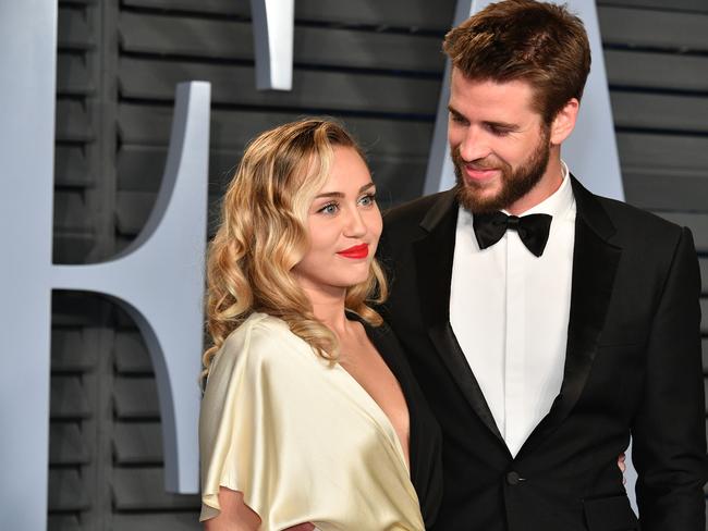 Cyrus and Hemsworth at the 2018 Vanity Fair Oscar Party. Picture: Getty