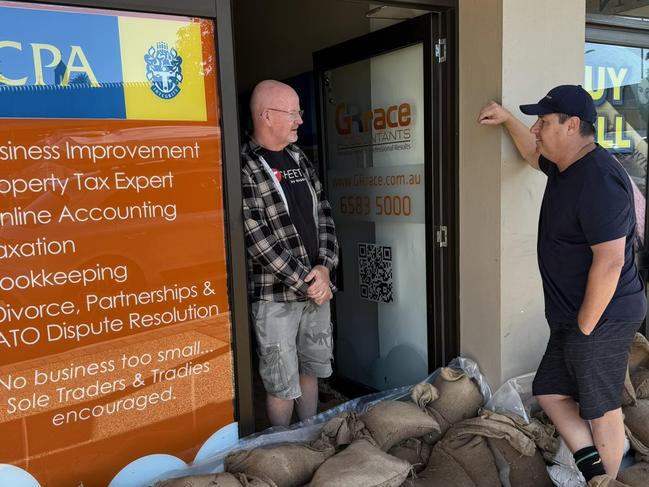 National's MP Pat Conaghan, right, checking in with Port Macquarie locals in his seat of Cowper on Saturday. Picture: Facebook