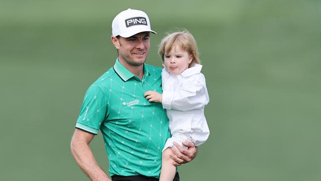 Laurie Canter of England smiles with his daughter, Hattie Canter. Picture: Getty