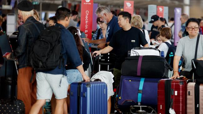 SYDNEY, AUSTRALIA - NewsWire Photos MARCH 28, 2024: Travellers get a headstart on their Easter holiday travel at Sydney Airport on Thursday morning. Picture: NCA NewsWire / Nikki Short