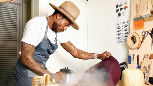 Modern Milliner Hat Maker Ugo Kennedy pictured at work in his Flinders Street studio. Picture: Shae Beplate.