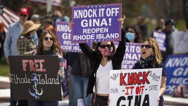 People protest stay-at-home orders outside the State House in Providence, Rhode Island, at the weekend. Picture: AP