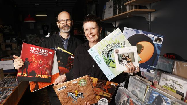 Adam MacGregor with wife Kirsty MacGregor with a selection of records to be released on the day. Tommy Gun Records in Hobart ahead of National Record Store Day. Picture: Nikki Davis-Jones