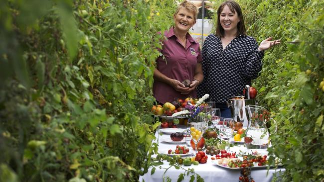 Founder of Off the Table Anna Yip (RHS) and co owner of Tasmanian Natural Garlic and Tomatoes Annette Reid at Selbourne. PICTURE CHRIS KIDD