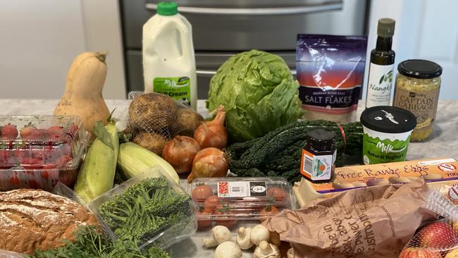 The two Harvest the Fleurieu produce boxes come to $55. Pictured with added extras – salt flakes, olive oil and kimchi. Picture: Jessica Galletly