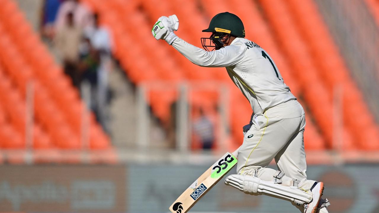 Usman Khawaja celebrates his fourth Test century.