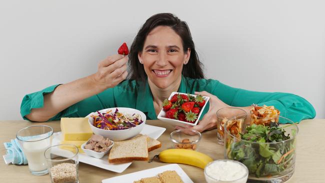 Dietian Melanie Grice with a typical day of food which is recommended for pregnant women. Picture: David Crosling