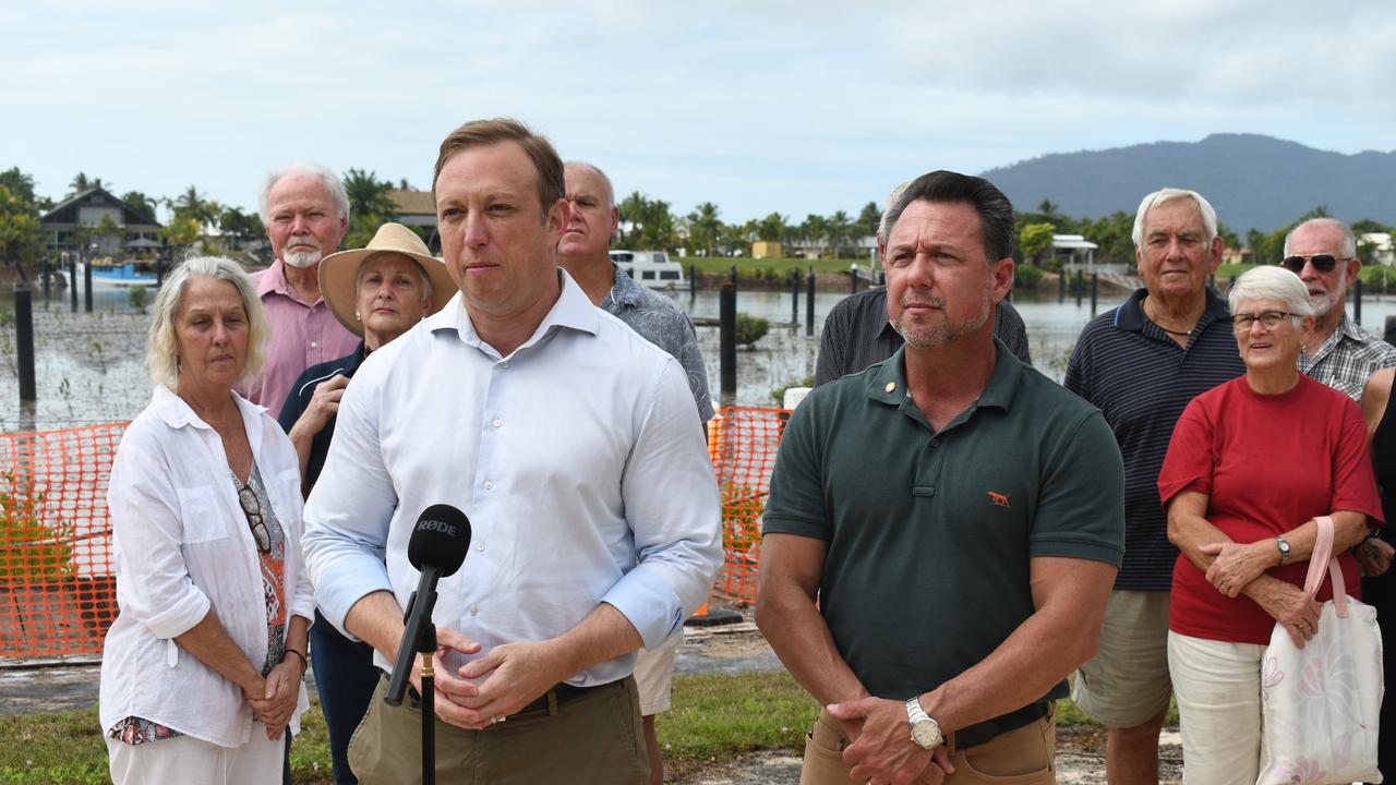 Queensland Premier Steven Miles, Hinchinbrook MP Nick Dametto and residents of the beleaguered Port Hinchinbrook development project in Cardwell on Friday. Picture: Cameron Bates