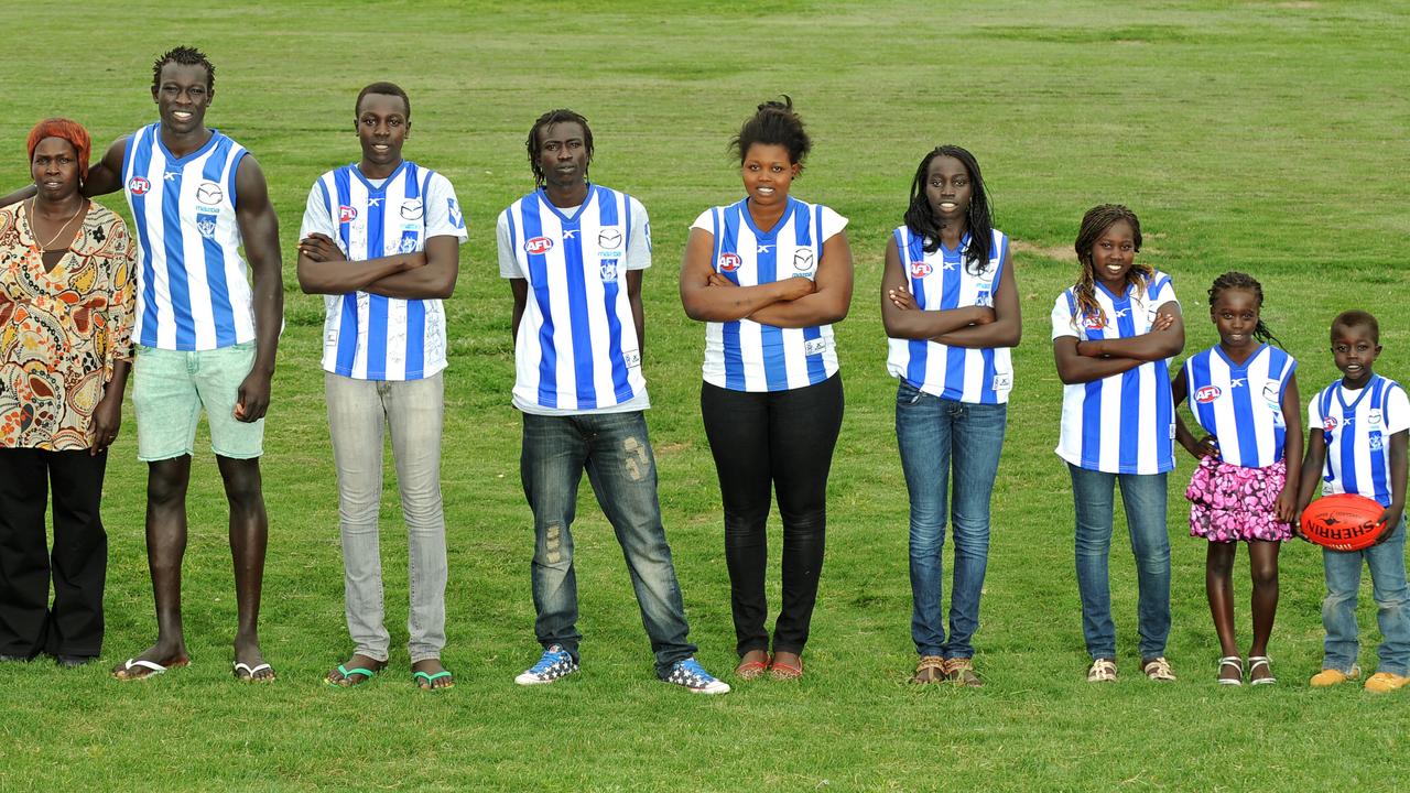 Majak with his mother Elizabeth and siblings Anthony, Augustino, Teresa, Sarah, Angelina, Mary and Ajak.