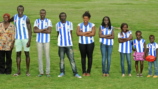 Majak with his mother Elizabeth and siblings Anthony, Augustino, Teresa, Sarah, Angelina, Mary and Ajak.