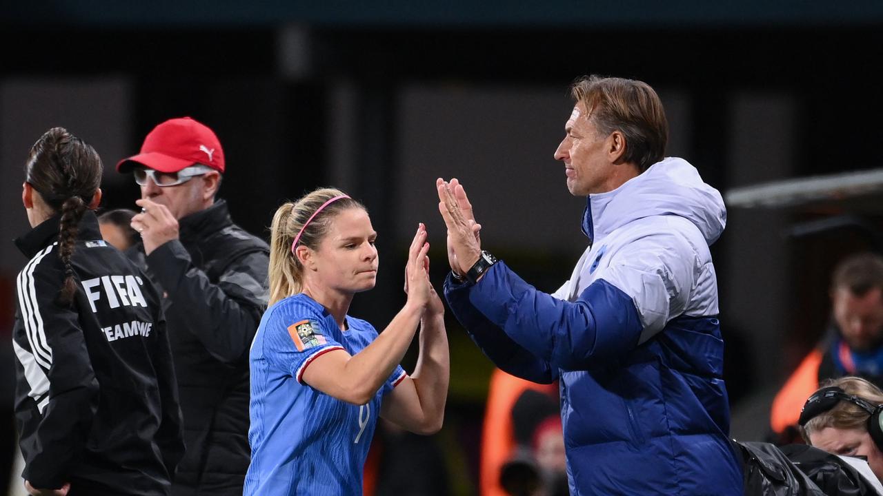 France coach Herve Renard (right) congratulates goalscorer Eugenie Le Sommer during the 4-0 win over Morocco. Picture: Franck Fife / AFP