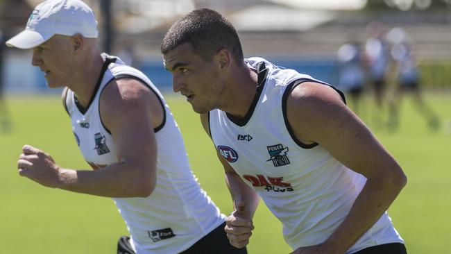 WINNING. Tom Rockliff, right in training with fellow midfielder Robbie Gray, has won over his new Port Adelaide team-mates with his strong desire for success. He is part of the new Power leadership group before playing a game with his new club. Picture: Ben Macmahon (AAP)