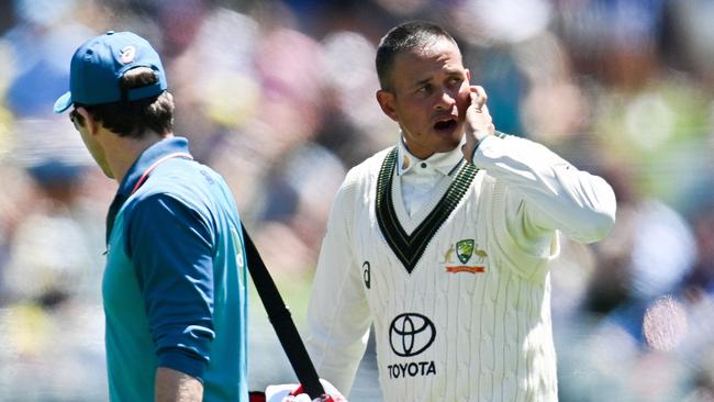 Usman Khawaja retires hurt at Adelaide Ovel Picture: AFP