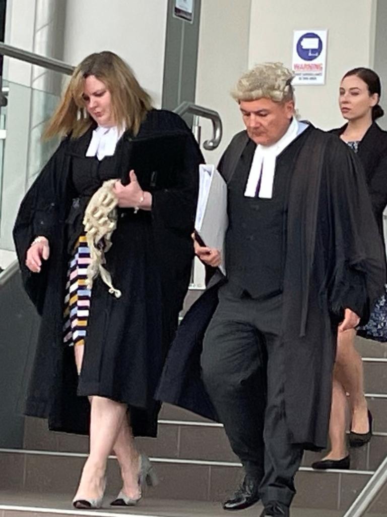 Crown prosecutors Samantha O'Rourke and Nigel Rees leaving Rockhampton courthouse.