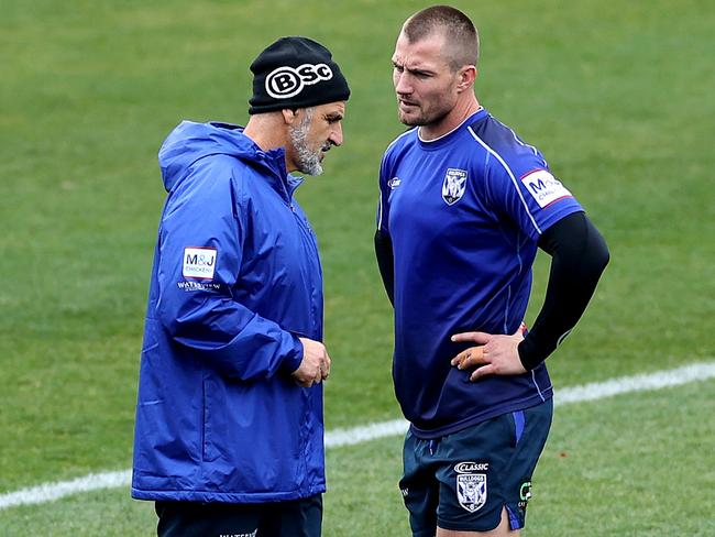 Interim coach Steve Georgallis with Kieran Foran taking the Canterbury Bulldogs training session at Belmore on the Dean Pay stepped down as coach. Picture. Phil Hillyard