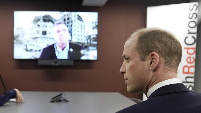 Prince William listens to Pascal Hundt, Senior Crisis Manager, International Committee of the Red Cross, dialling in from Gaza, during a visits of the British Red Cross at British Red Cross HQ in London. Picture: Getty Images