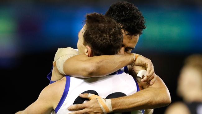 Lindsay Thomas celebrates a goal with Brent Harvey. Picture: Getty Images