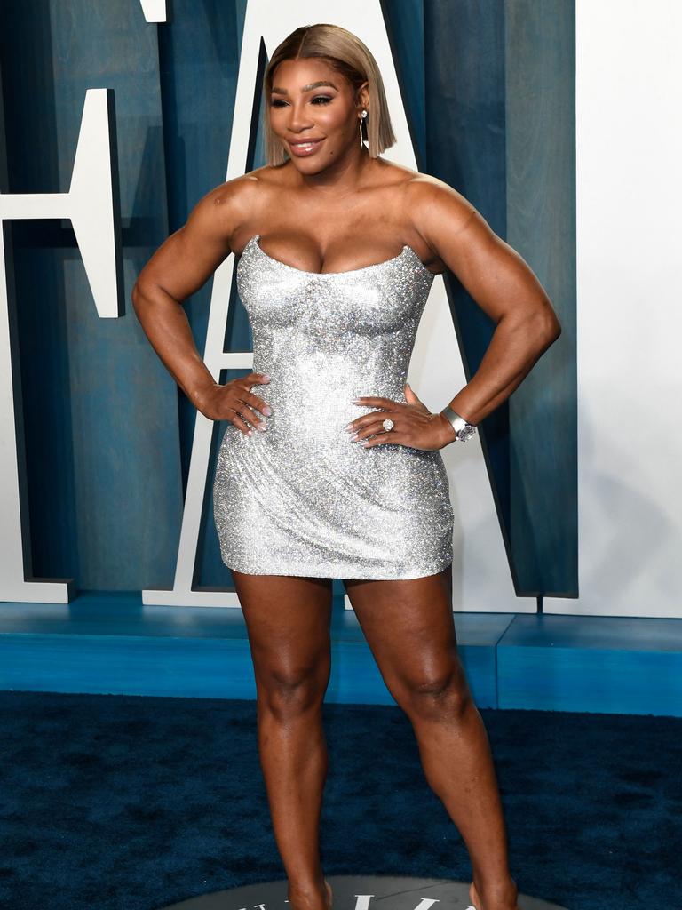 Serena poses for photographers at the Vanity Fair after-party. (Photo by Patrick T. FALLON / AFP)