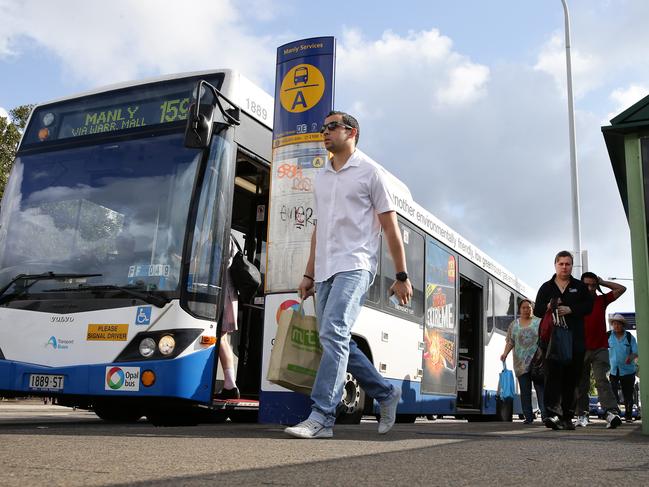 I'm writing a feature article about the planned Bus Rapid Transit system on the northern beaches. I just want some photos of commuters boarding the bus at this stop