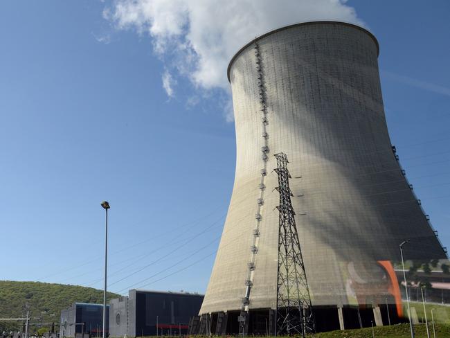 (FILES) In this file photo taken on May 10, 2017, shows cooling towers of the nuclear power plant in Chooz, northern France. - One of the reactors of the nuclear power station of Chooz has been shut down since midnight August 21, 2020, and its second reactor is likely to also be shut down soon due to the low flow of the Meuse River, according to the site's management. (Photo by FRANCOIS LO PRESTI / AFP)