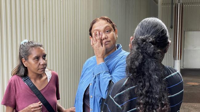 Pukumani Alimankinni's cousin-sister Nicole Intalui (centre) with relatives Mary Ferber-Tomlins (left) and Celvester Munkanome (right) outside court on Thursday. Picture: Jason Walls