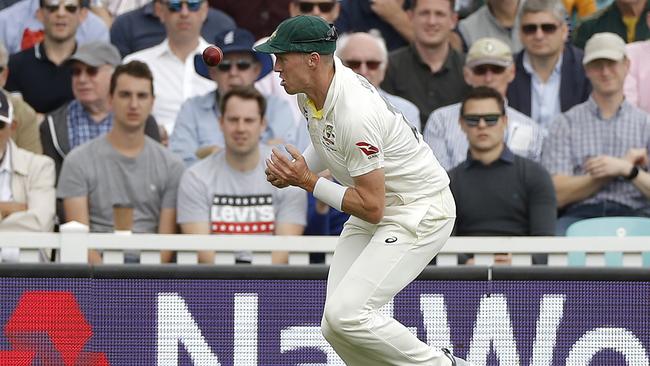 Peter Siddle drops Joe Root out in the deep. Picture: Getty Images